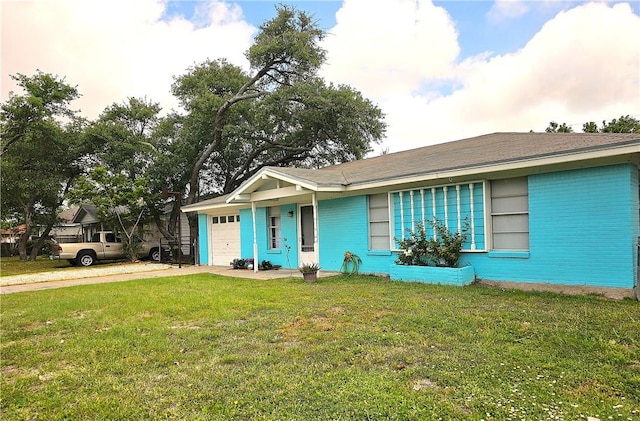 1330 Red Bird Dr, Rockport, TX 78382 - view of front of property with a garage, concrete driveway, and a front yard