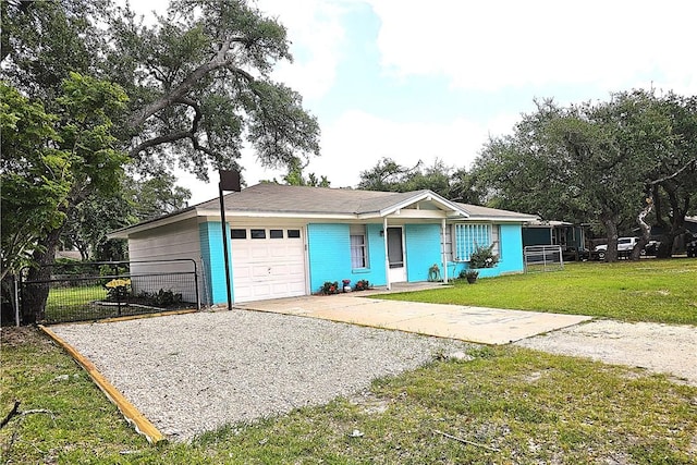 1330 Red Bird Dr, Rockport, TX 78382 - ranch-style house with gravel driveway and an attached garage