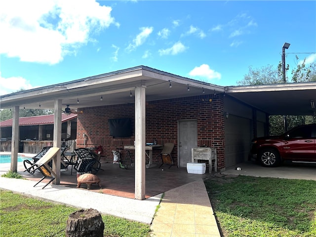 exterior space featuring a carport