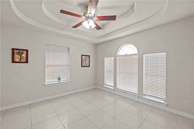 8230 Excalibur, Corpus Christi, TX 78414 - unfurnished room featuring a raised ceiling, ceiling fan, and light tile patterned floors