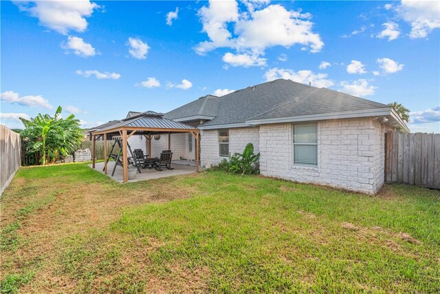 8230 Excalibur, Corpus Christi, TX 78414 - back of property with a gazebo, a patio, a fenced backyard, and roof with shingles