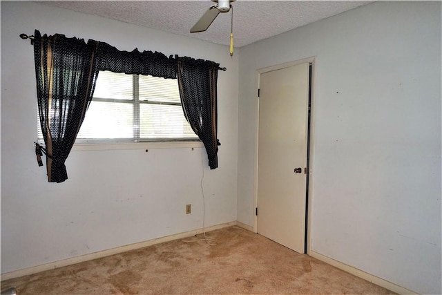 128 Granby Pl, Portland, TX 78374 - empty room with light colored carpet, a ceiling fan, and a textured ceiling