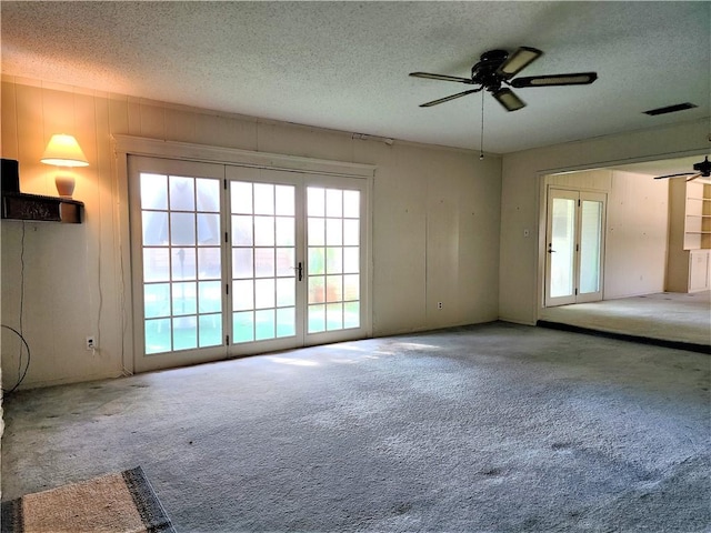 128 Granby Pl, Portland, TX 78374 - unfurnished room featuring carpet flooring, a ceiling fan, and a textured ceiling