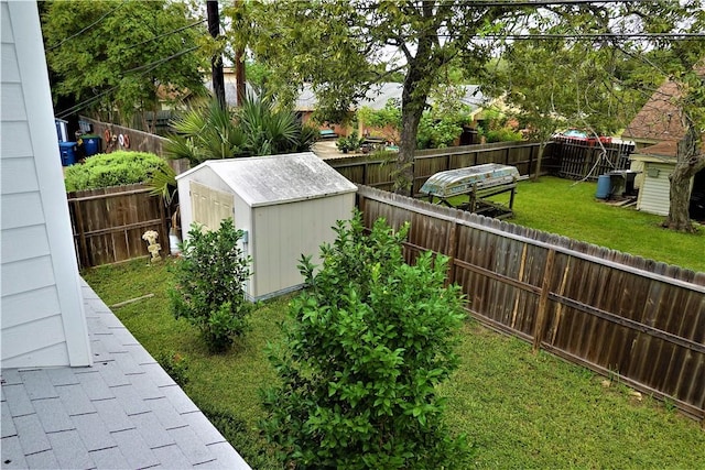 128 Granby Pl, Portland, TX 78374 - view of yard with a storage shed and an outbuilding