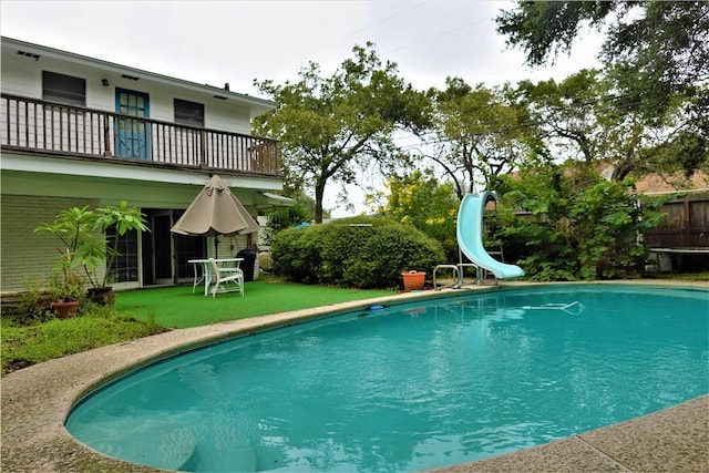 128 Granby Pl, Portland, TX 78374 - view of pool featuring a water slide and fence