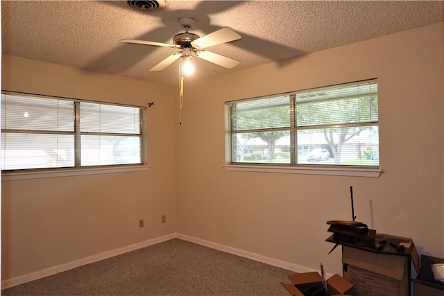 128 Granby Pl, Portland, TX 78374 - carpeted empty room with healthy amount of natural light, a textured ceiling, ceiling fan, and baseboards