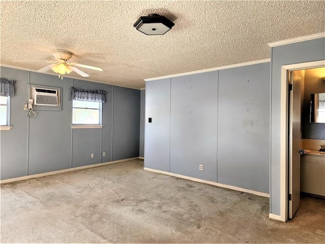 128 Granby Pl, Portland, TX 78374 - unfurnished bedroom with a wall unit AC, ornamental molding, a textured ceiling, and carpet floors