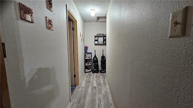 10200 Shane Dr, Corpus Christi, TX 78410 - hall with light wood finished floors and a textured ceiling