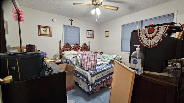 10200 Shane Dr, Corpus Christi, TX 78410 - carpeted bedroom featuring a textured ceiling and ceiling fan