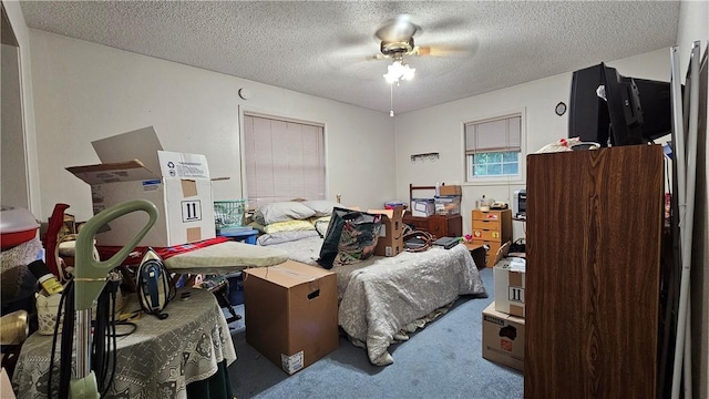 10200 Shane Dr, Corpus Christi, TX 78410 - bedroom featuring carpet, a textured ceiling, and ceiling fan