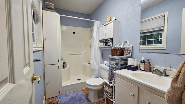 10200 Shane Dr, Corpus Christi, TX 78410 - bathroom with vanity, a shower stall, and tile patterned floors