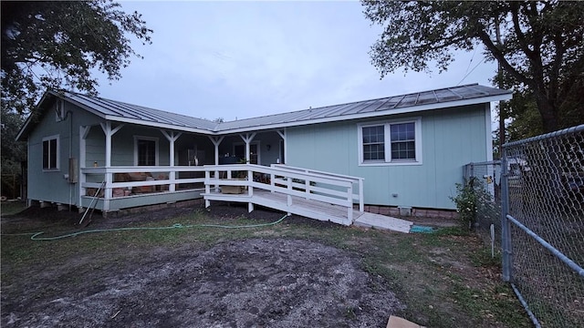 10200 Shane Dr, Corpus Christi, TX 78410 - rear view of property with a metal roof