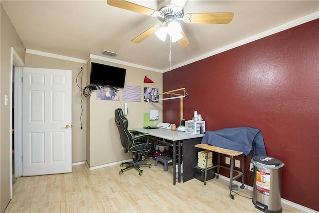 office area featuring ceiling fan, ornamental molding, and hardwood / wood-style floors