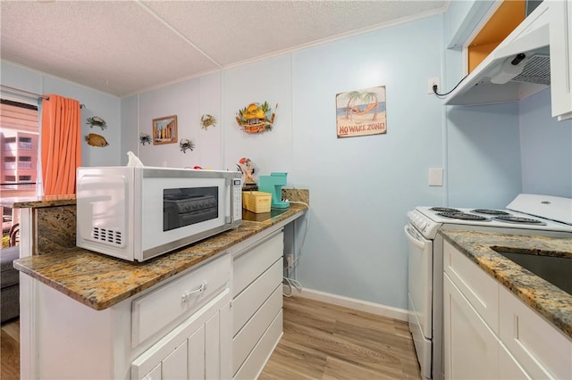 kitchen featuring white cabinetry, light stone counters, white appliances, light hardwood / wood-style flooring, and exhaust hood