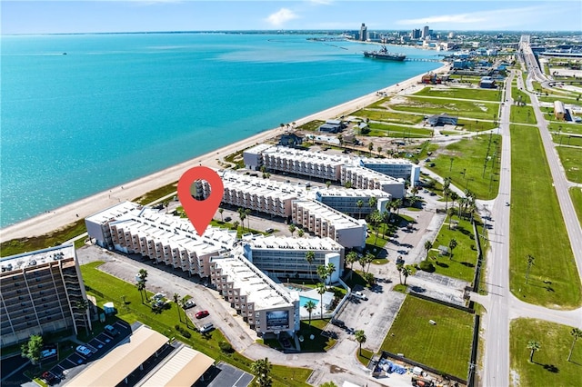 bird's eye view featuring a beach view and a water view