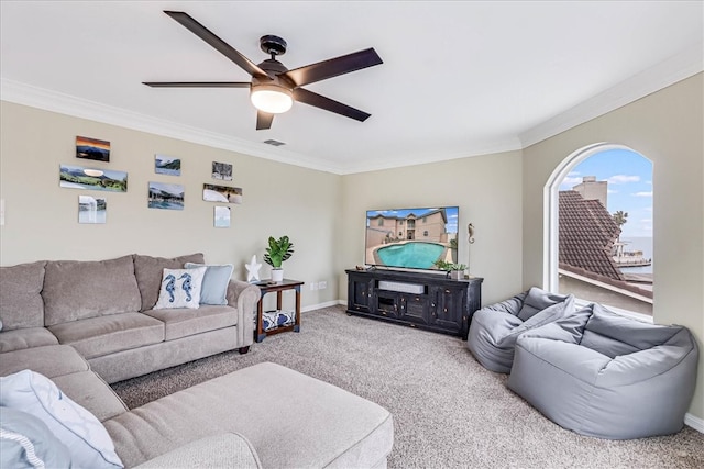 living room with carpet floors and ornamental molding