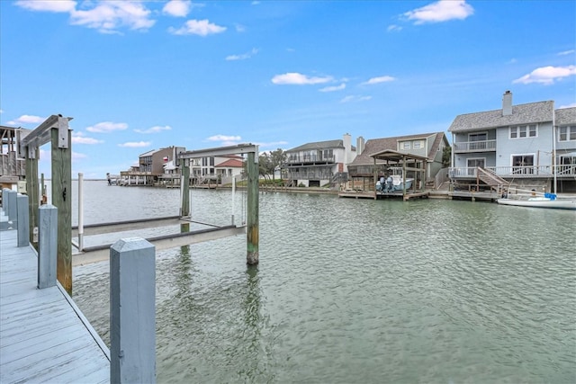 dock area with a water view