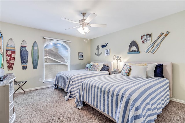 bedroom with ceiling fan and carpet