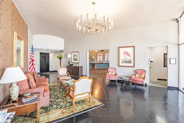 living room with a notable chandelier