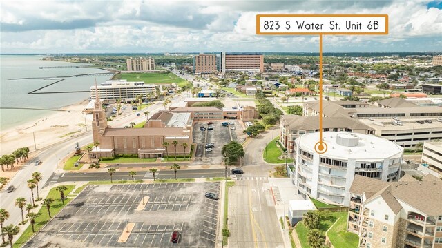 birds eye view of property featuring a water view