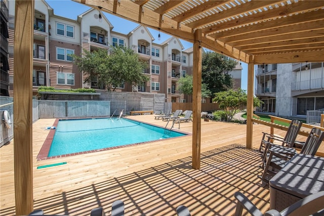 view of swimming pool featuring a pergola