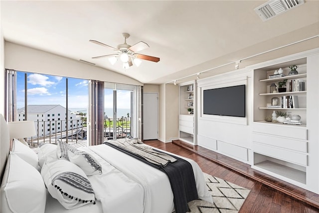 bedroom with lofted ceiling, dark hardwood / wood-style floors, access to exterior, and ceiling fan