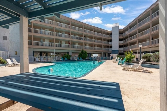 view of pool with a patio