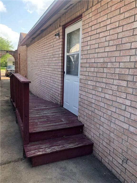 1705 Sherman St, Corpus Christi, TX 78416 - property entrance featuring brick siding