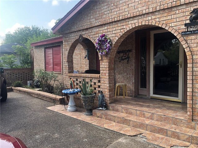 1705 Sherman St, Corpus Christi, TX 78416 - entrance to property featuring brick siding