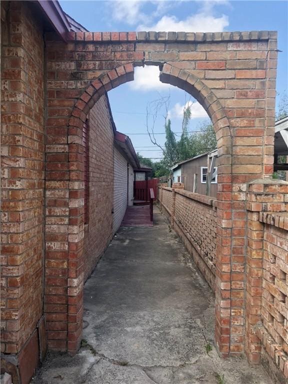1705 Sherman St, Corpus Christi, TX 78416 - view of property exterior featuring brick siding