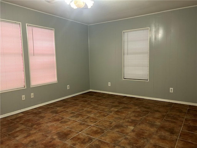 1705 Sherman St, Corpus Christi, TX 78416 - spare room with ornamental molding and baseboards