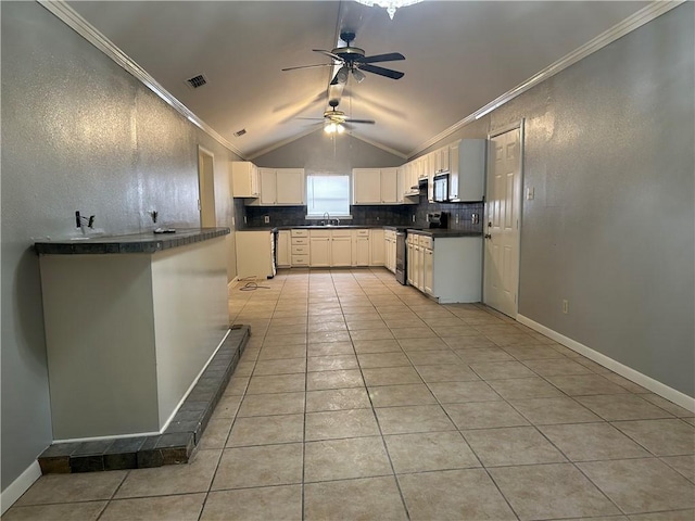 1705 Sherman St, Corpus Christi, TX 78416 - kitchen featuring stainless steel range with electric cooktop, vaulted ceiling, crown molding, ceiling fan, and dark countertops