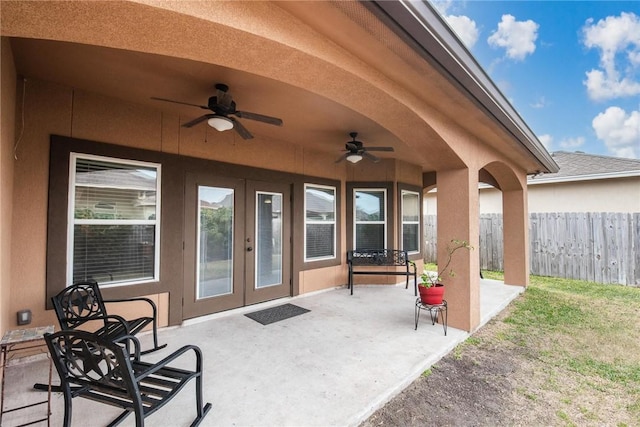 view of patio / terrace with french doors and ceiling fan