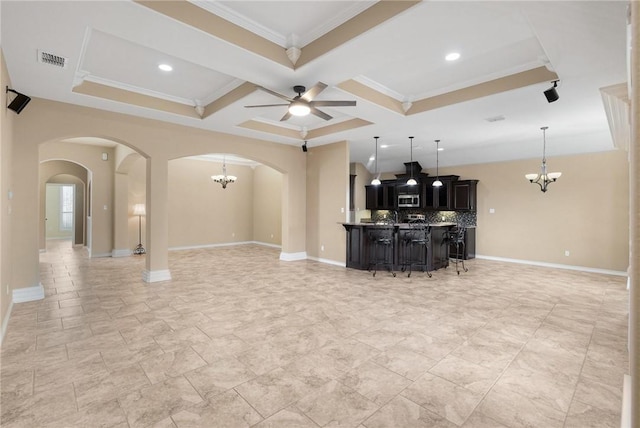 living room featuring coffered ceiling, ceiling fan with notable chandelier, ornamental molding, and beamed ceiling