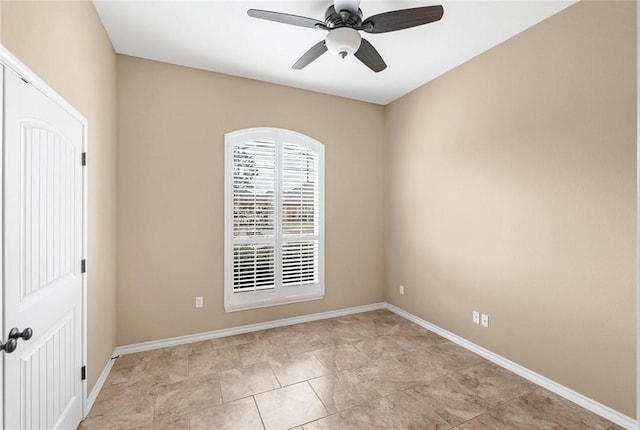 unfurnished room with ceiling fan