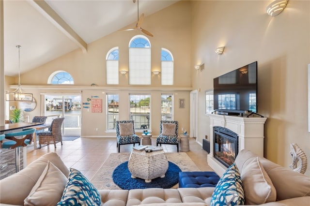 tiled living room with high vaulted ceiling, a wealth of natural light, and beam ceiling