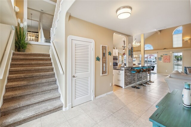 stairway featuring tile patterned floors