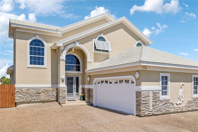 view of front of property with a garage