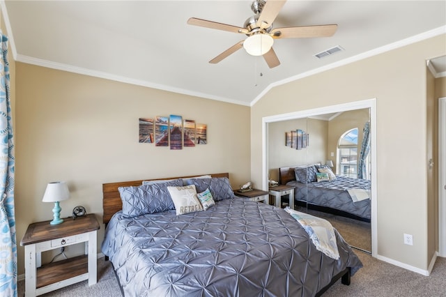 bedroom featuring lofted ceiling, ceiling fan, carpet floors, and ornamental molding