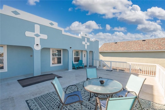 13965 Ports O Call Dr Unit D, Corpus Christi, TX 78418 - view of patio with outdoor dining space