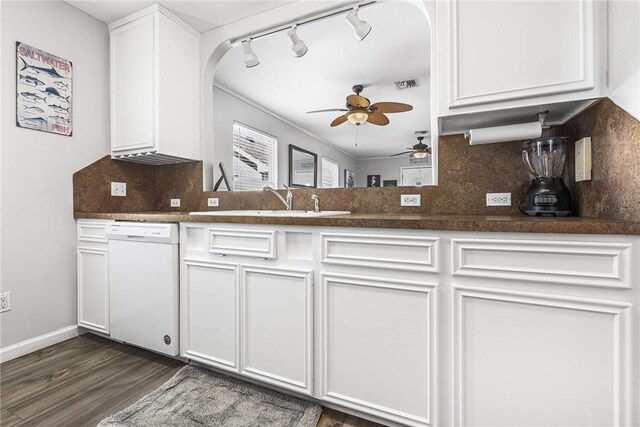 13965 Ports O Call Dr Unit D, Corpus Christi, TX 78418 - kitchen with white dishwasher, a ceiling fan, dark wood-type flooring, arched walkways, and white cabinets