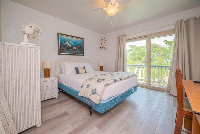 bedroom with wood finished floors, a ceiling fan, and access to exterior