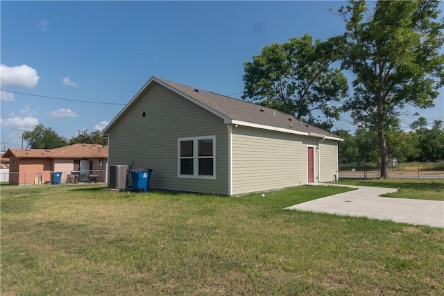 401 E Empresario St, Refugio, TX 78377 - view of home's exterior with cooling unit and a patio