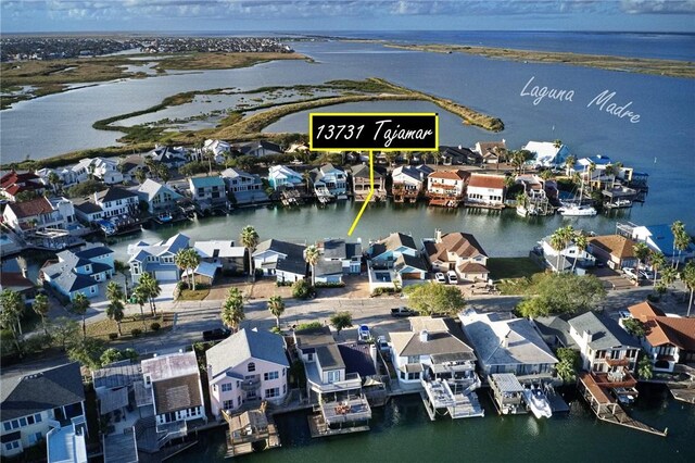 13731 Tajamar St, Corpus Christi, TX 78418 - aerial perspective of suburban area featuring a large body of water