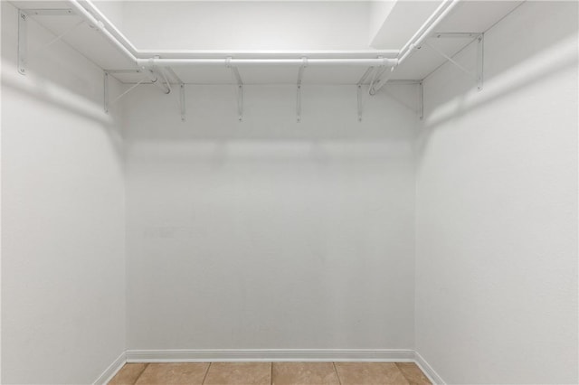 13731 Tajamar St, Corpus Christi, TX 78418 - walk in closet featuring light tile patterned flooring