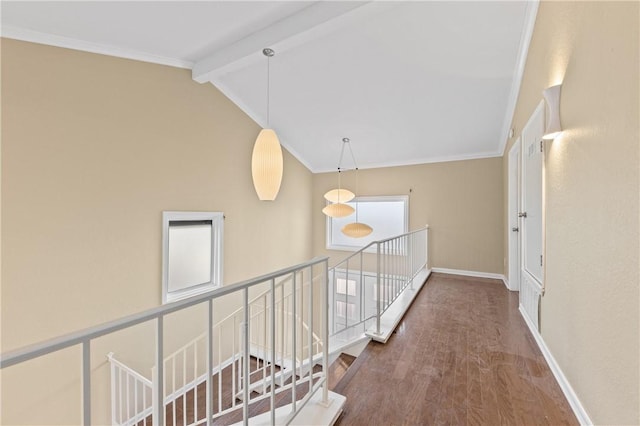 13731 Tajamar St, Corpus Christi, TX 78418 - corridor featuring an upstairs landing, wood finished floors, baseboards, and ornamental molding