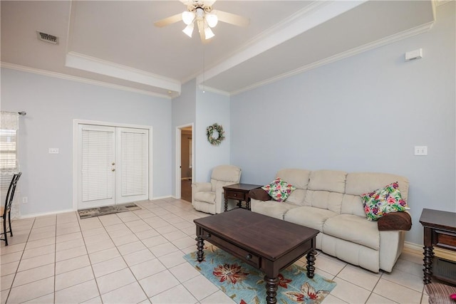 3829 Brockhampton Ct, Corpus Christi, TX 78414 - living room with ornamental molding, light tile patterned floors, ceiling fan, and a raised ceiling
