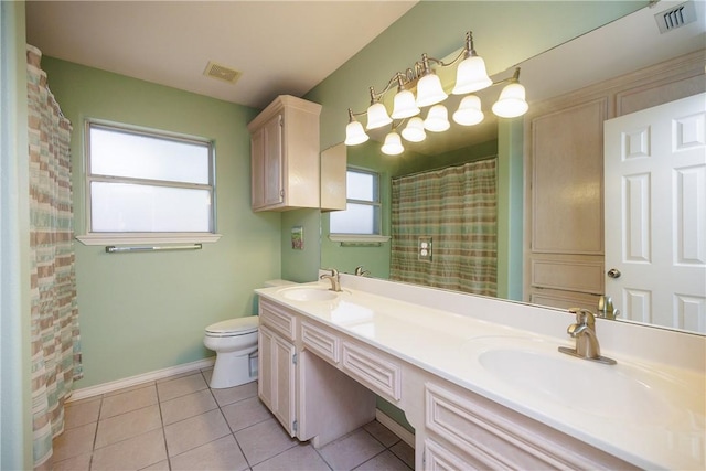 3829 Brockhampton Ct, Corpus Christi, TX 78414 - full bathroom featuring double vanity, tile patterned flooring, and curtained shower