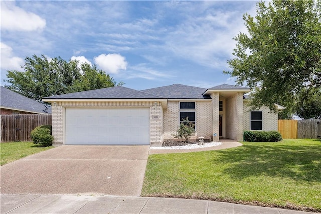 3829 Brockhampton Ct, Corpus Christi, TX 78414 - view of front facade with driveway, brick siding, and a garage
