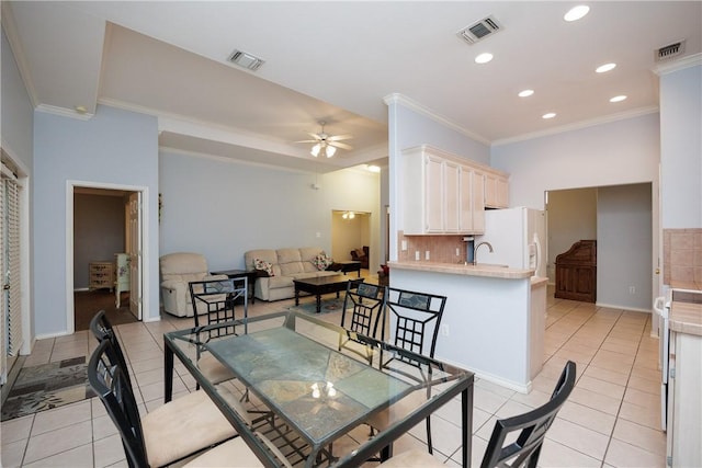 3829 Brockhampton Ct, Corpus Christi, TX 78414 - dining area featuring light tile patterned floors, crown molding, a ceiling fan, and recessed lighting